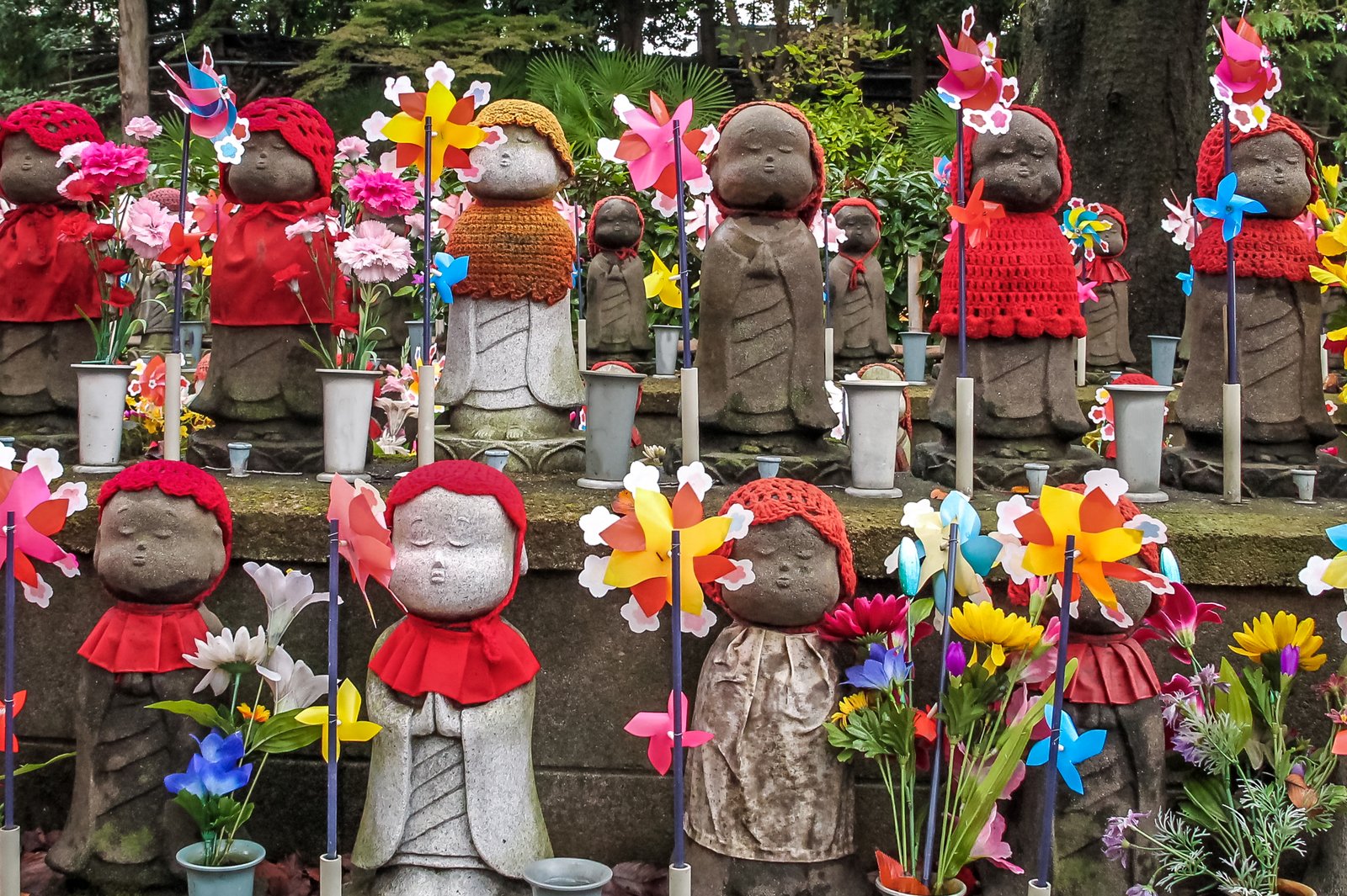 Jizo statues at the cemetery of Zojo-ji temple, Tokyo, Japan