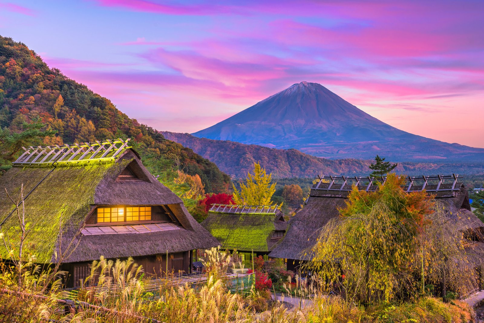 Mt. Fuji, Japan and historic village during an autumn twilight.